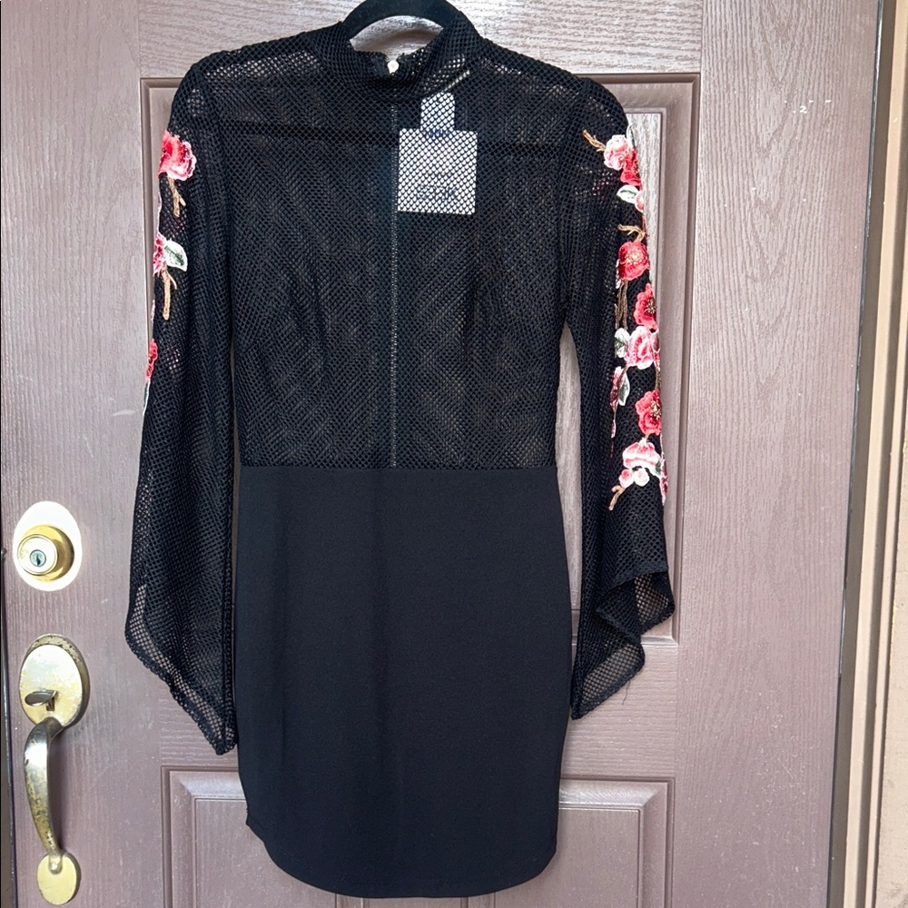 Elegant Black Dress with Floral Accents